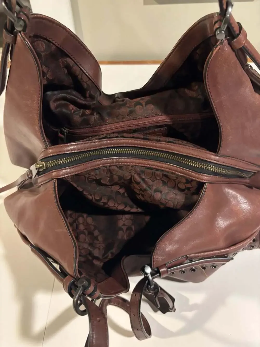Coach Brown Leather Hobo Shoulder Bag with Grommets and Turnlock Closure